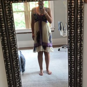 A cream and purple dress
